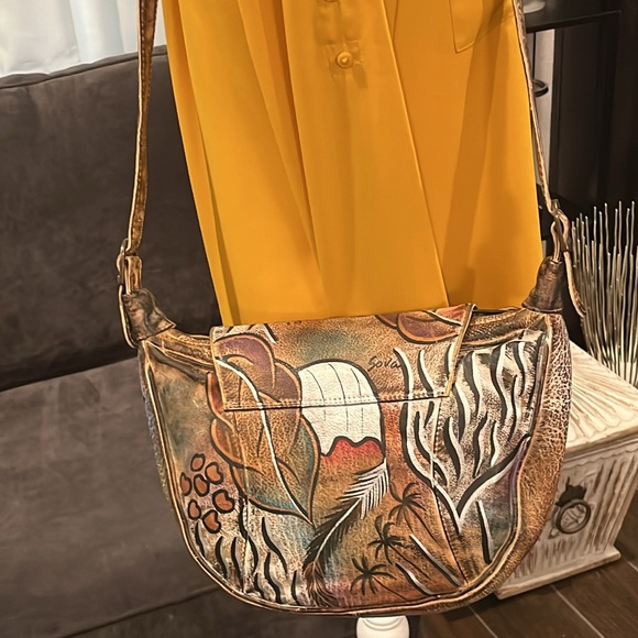 Sova Hand-painted Leather Crossbody. Never  used. Earth tone with silver accent - Picture 6 of 15